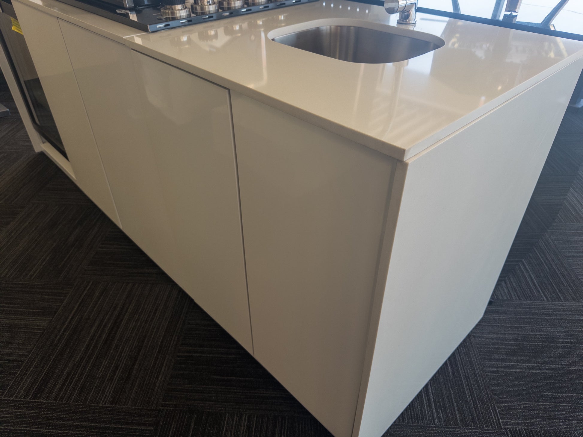 Grill King Signature Series Outdoor BBQ Kitchen Package – Rockpool White Stone Bench-Top, White Aluminium Cabinets | 4-Burner Built-In BBQ + Rotisserie + 150L Outdoor Fridge